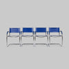 Vintage Set of Four Chrome and Yves Klein Blue Leather Chairs